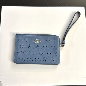 COACH Women's Sky Blue Perforated Floral Leather Wristlet Wallet